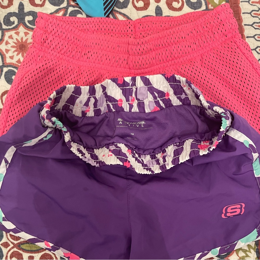 3 pair of girls athletic shorts. 7/8 and 8/10 used but no stains or tears